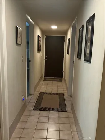 a white toilet sitting next to a shower curtain