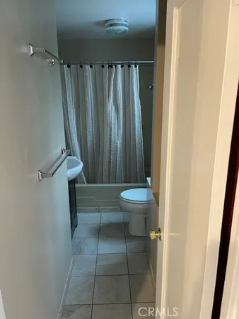 a view of balcony with two chairs and a table