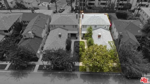 an aerial view of multi story residential apartment building