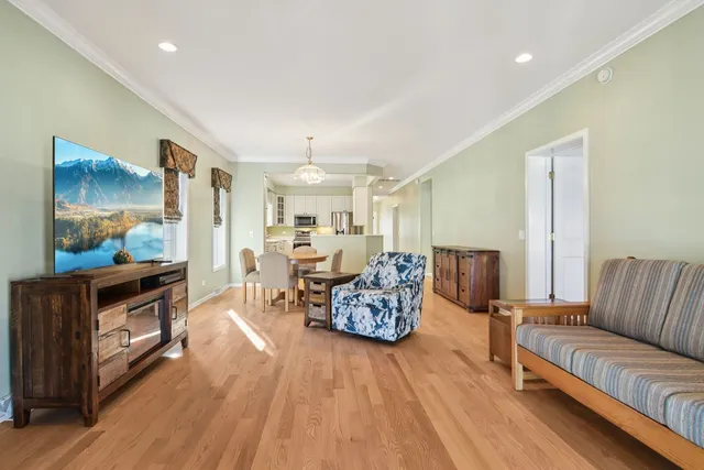 a kitchen with stainless steel appliances white cabinets and a sink
