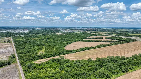 a view of a city with an ocean