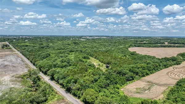 a view of a yard with an outdoor space and seating area