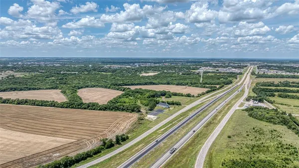 a view of a balcony with an outdoor space and hardwood