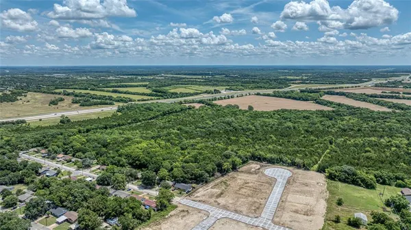 a view of a yard with an outdoor space