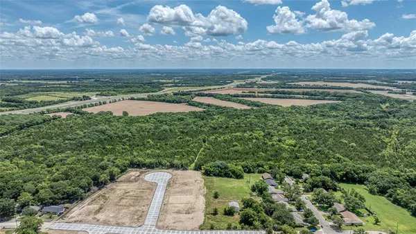 a view of a garden with an outdoor space