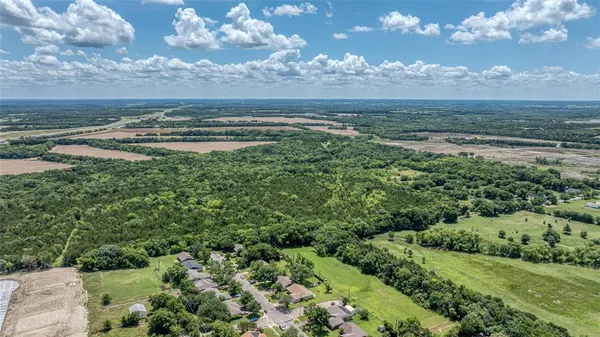 a view of a lake with sunset view