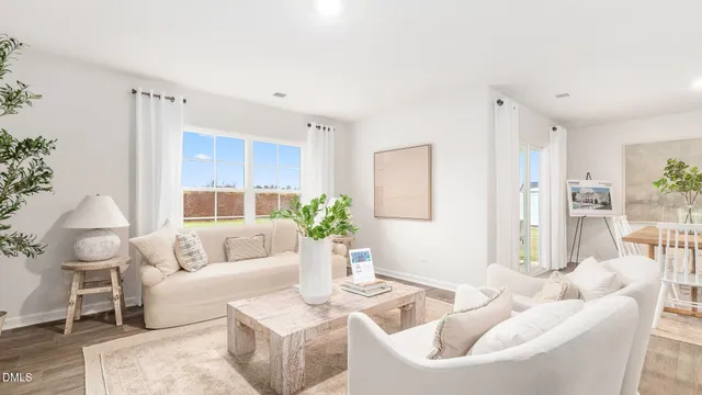 a bedroom with a bed and a lamp