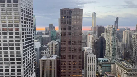 a view of a city with tall buildings