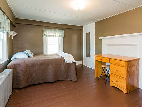 10 Metropolitan Avenue Ashland, MA 01721 - Photo 11 of 22 a bedroom with a bed and dresser