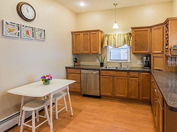 10 Metropolitan Avenue Ashland, MA 01721 - Photo 16 of 22 a kitchen with a sink cabinets and window