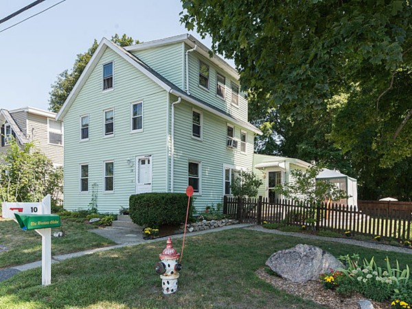 10 Metropolitan Avenue Ashland, MA 01721 - Photo 2 of 22 a view of a house with a yard and plants
