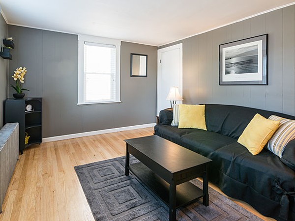 10 Metropolitan Avenue Ashland, MA 01721 - Photo 21 of 22 a living room with furniture and a wooden floor