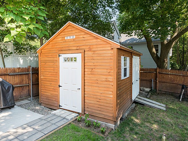10 Metropolitan Avenue Ashland, MA 01721 - Photo 4 of 22 a view of backyard with a small cabin and a chair