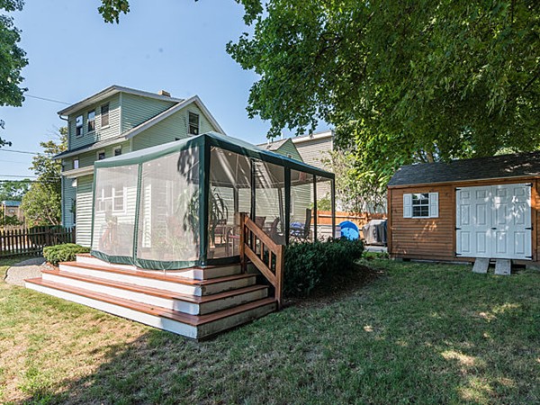 10 Metropolitan Avenue Ashland, MA 01721 - Photo 5 of 22 a front view of a house with garden