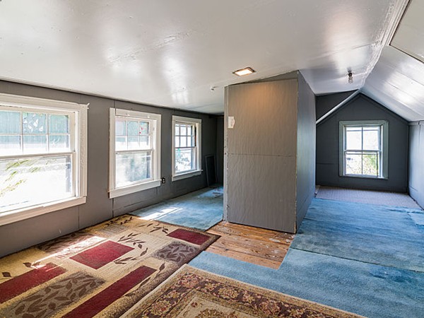 10 Metropolitan Avenue Ashland, MA 01721 - Photo 7 of 22 a view of livingroom with hardwood floor and window