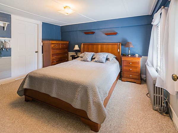 10 Metropolitan Avenue Ashland, MA 01721 - Photo 8 of 22 a bedroom with bed and window