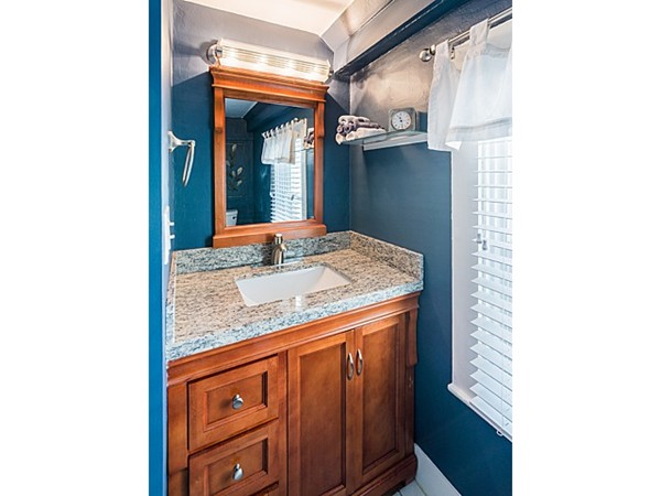 10 Metropolitan Avenue Ashland, MA 01721 - Photo 9 of 22 a bathroom with a granite countertop sink and a mirror