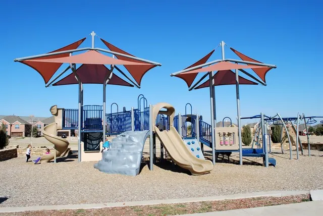 a view of a bedroom with gym equipment and umbrella