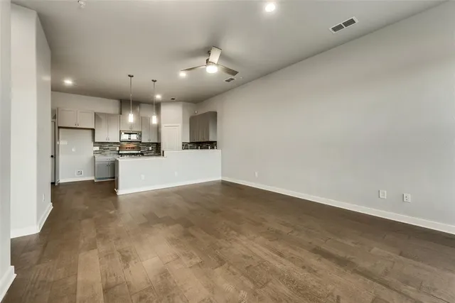 a view of kitchen with wooden floor