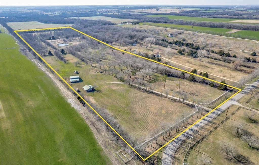 586 Pleasant Home Road Sherman, TX 75092 - Photo 2 of 25 a view of a tennis court