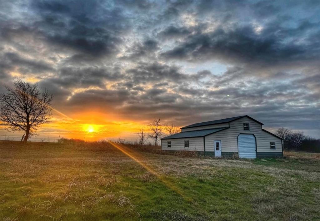 586 Pleasant Home Road Sherman, TX 75092 - Photo 25 of 25 a house view with a garden space