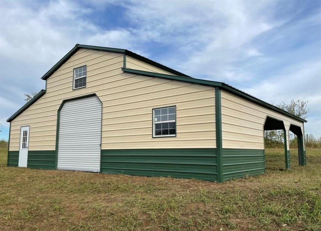 586 Pleasant Home Road Sherman, TX 75092 - Photo 8 of 25 a view of a house with a backyard