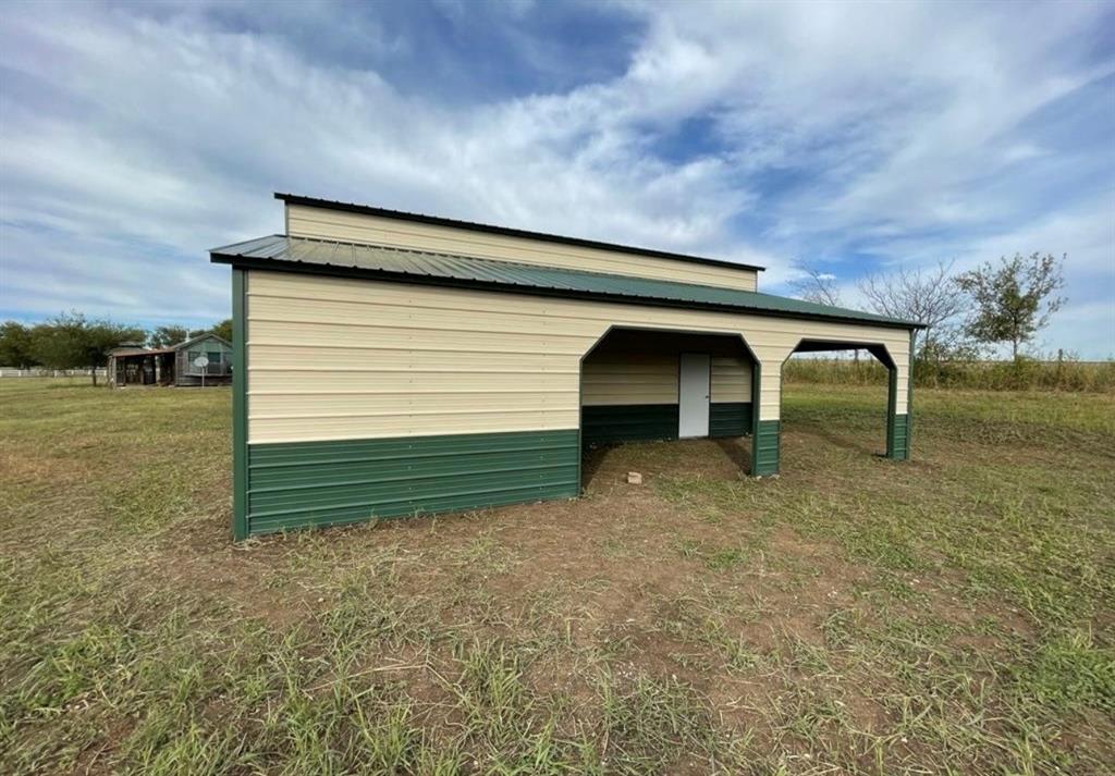 586 Pleasant Home Road Sherman, TX 75092 - Photo 10 of 25 a view of outdoor space and yard