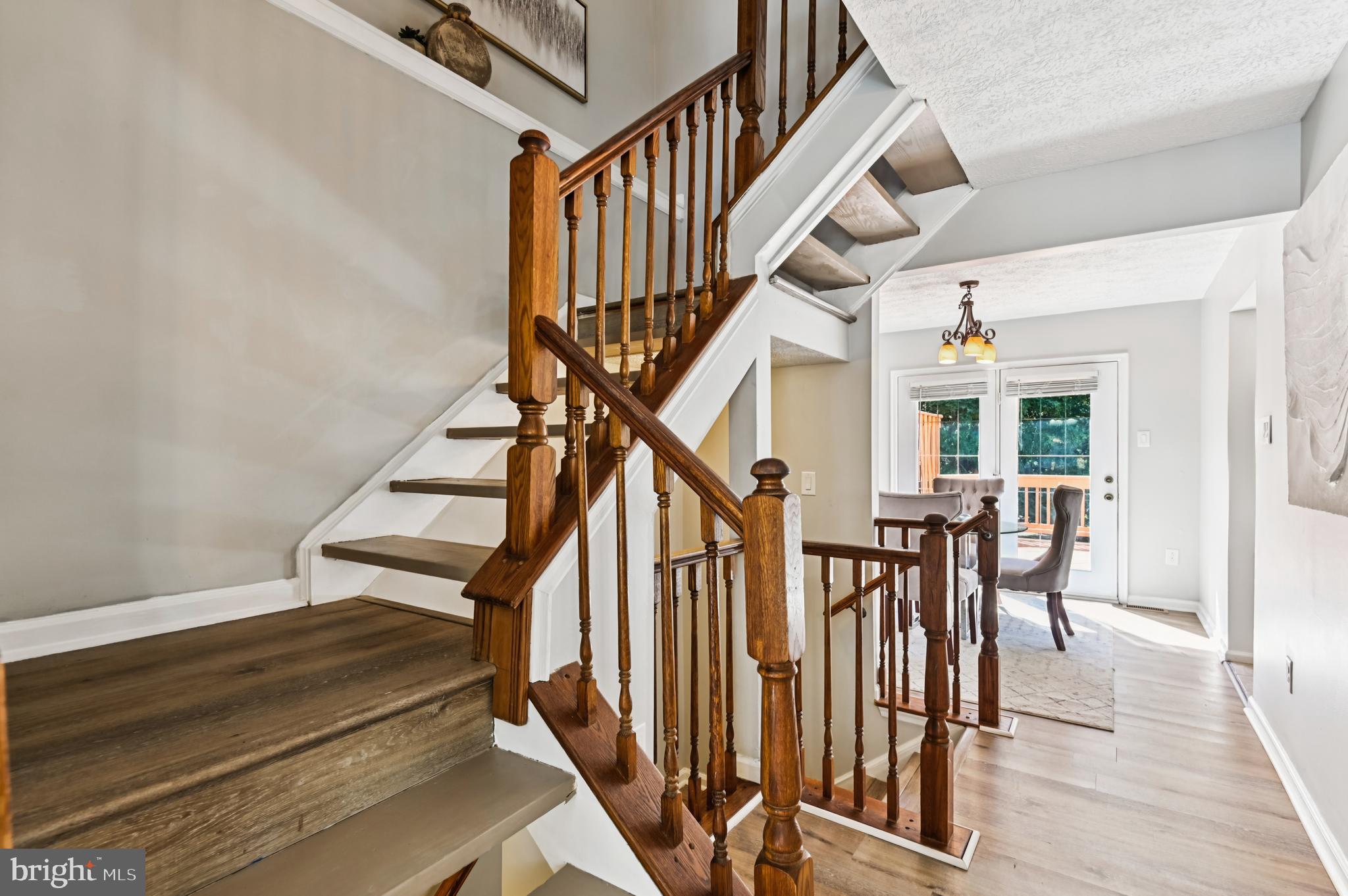 19 Championship Court, Unit K5 Owings Mills, MD 21117 - Photo 13 of 35 a view of entryway and hall with wooden floor