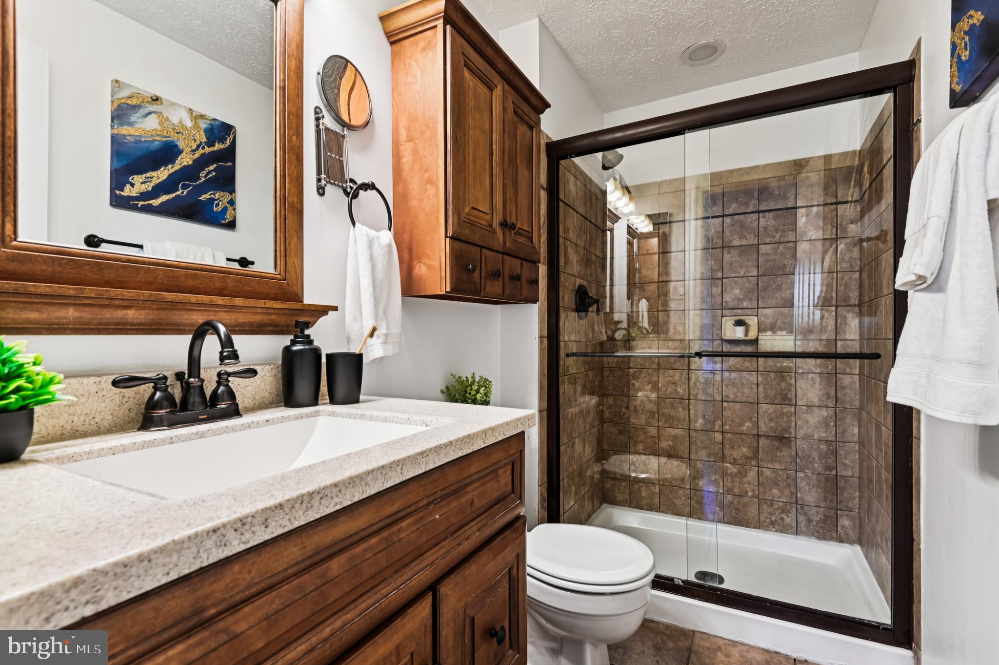 19 Championship Court, Unit K5 Owings Mills, MD 21117 - Photo 17 of 35 a bathroom with a sink and a mirror