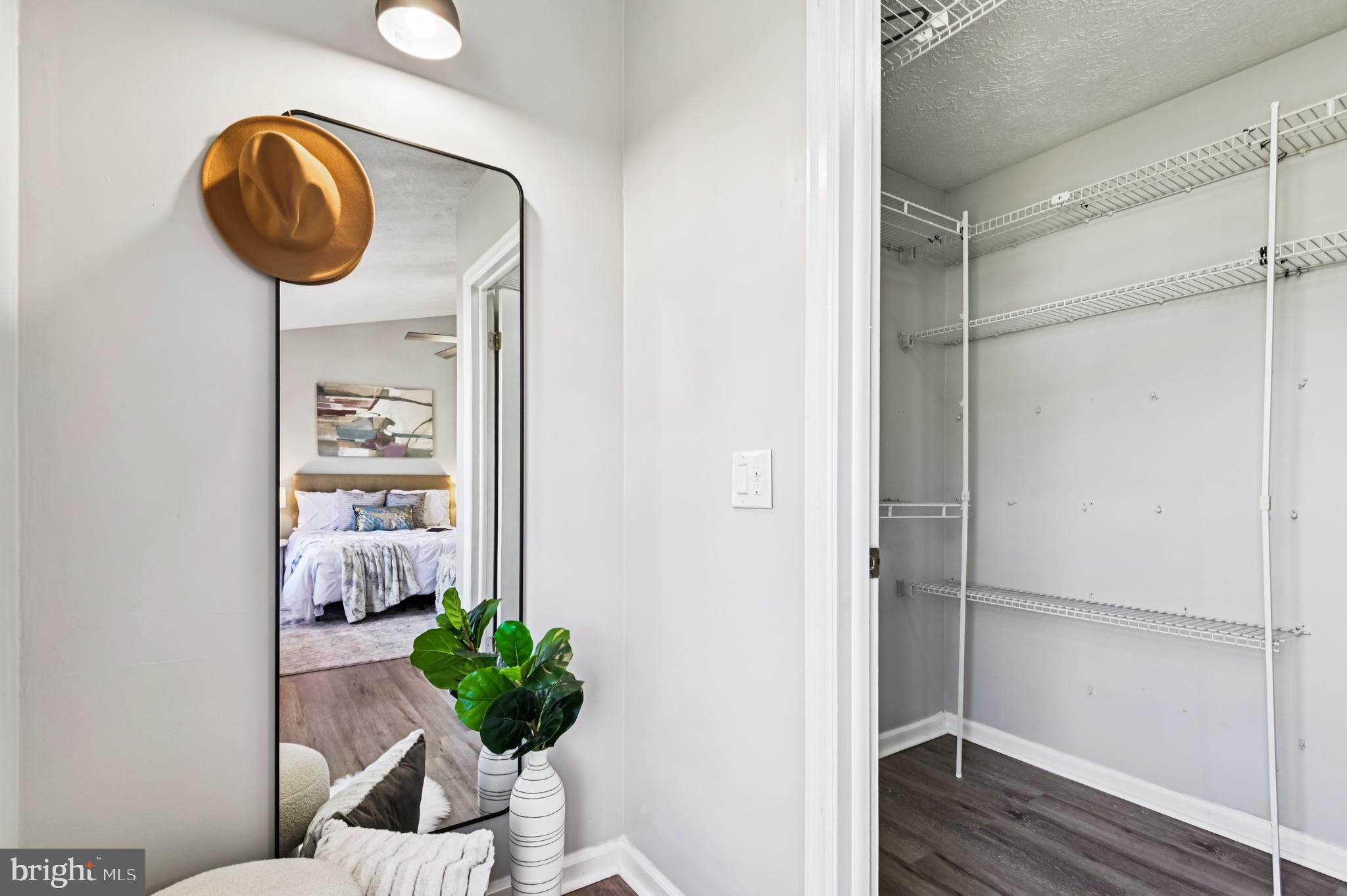 19 Championship Court, Unit K5 Owings Mills, MD 21117 - Photo 18 of 35 a view of a hallway with wooden floor