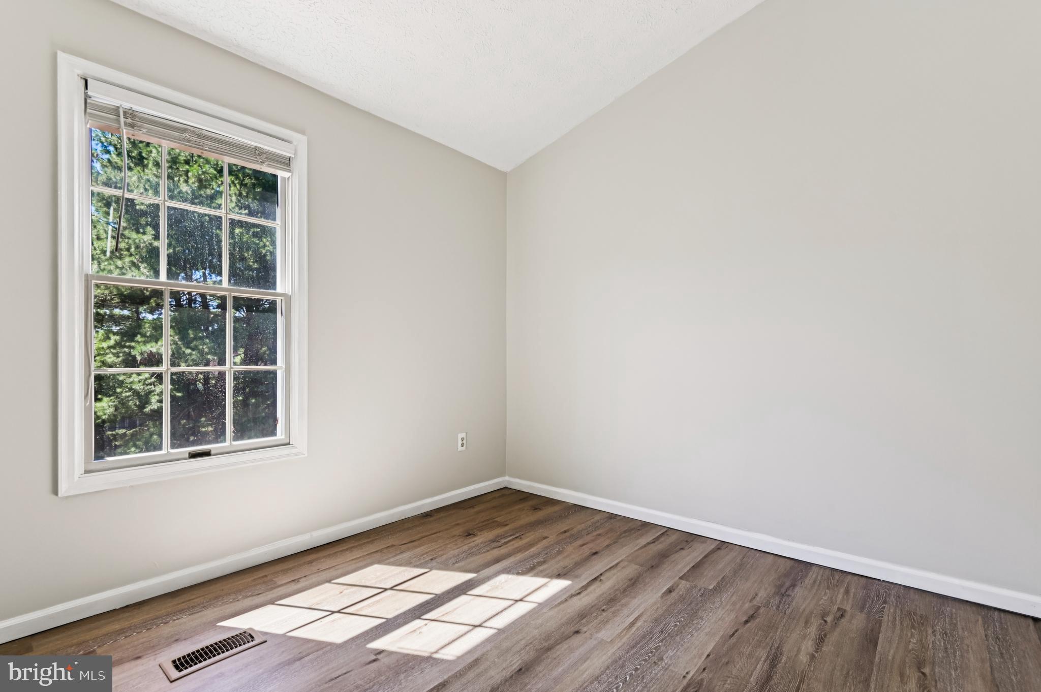 19 Championship Court, Unit K5 Owings Mills, MD 21117 - Photo 23 of 35 an empty room with a window