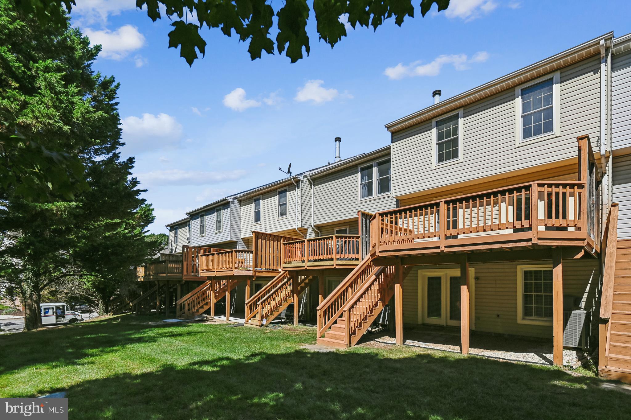 19 Championship Court, Unit K5 Owings Mills, MD 21117 - Photo 31 of 35 a view of a house with a yard