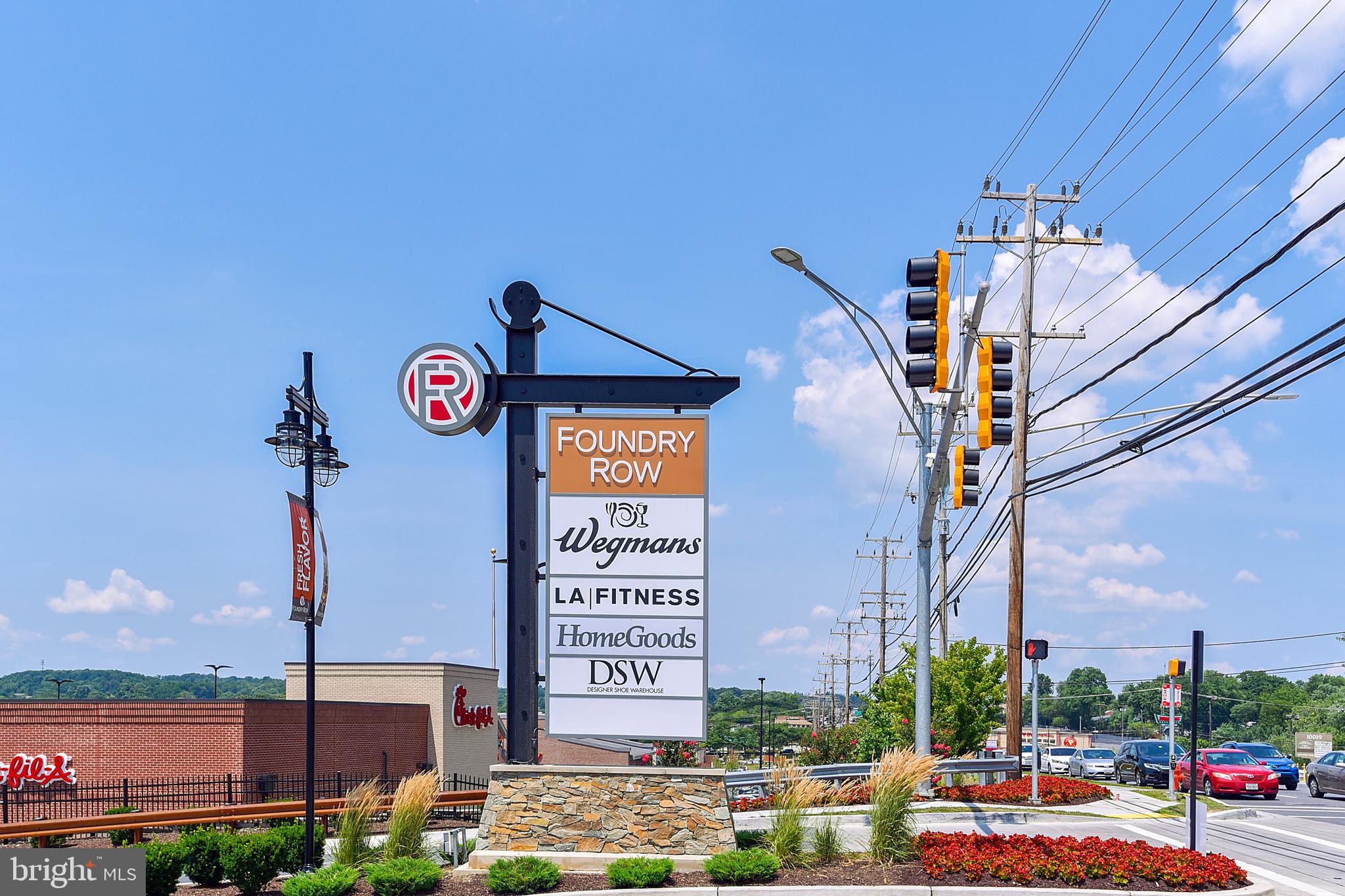 19 Championship Court, Unit K5 Owings Mills, MD 21117 - Photo 32 of 35 a front view of a building with parking