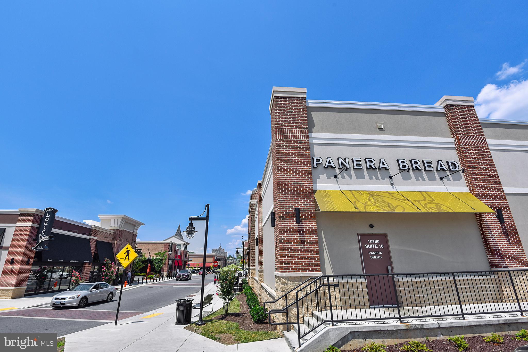 19 Championship Court, Unit K5 Owings Mills, MD 21117 - Photo 33 of 35 a sign on the wall of a building