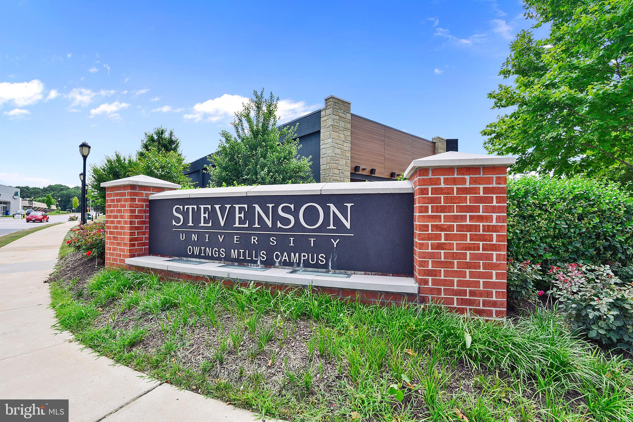19 Championship Court, Unit K5 Owings Mills, MD 21117 - Photo 35 of 35 a sign of golf club on a wall under a tree