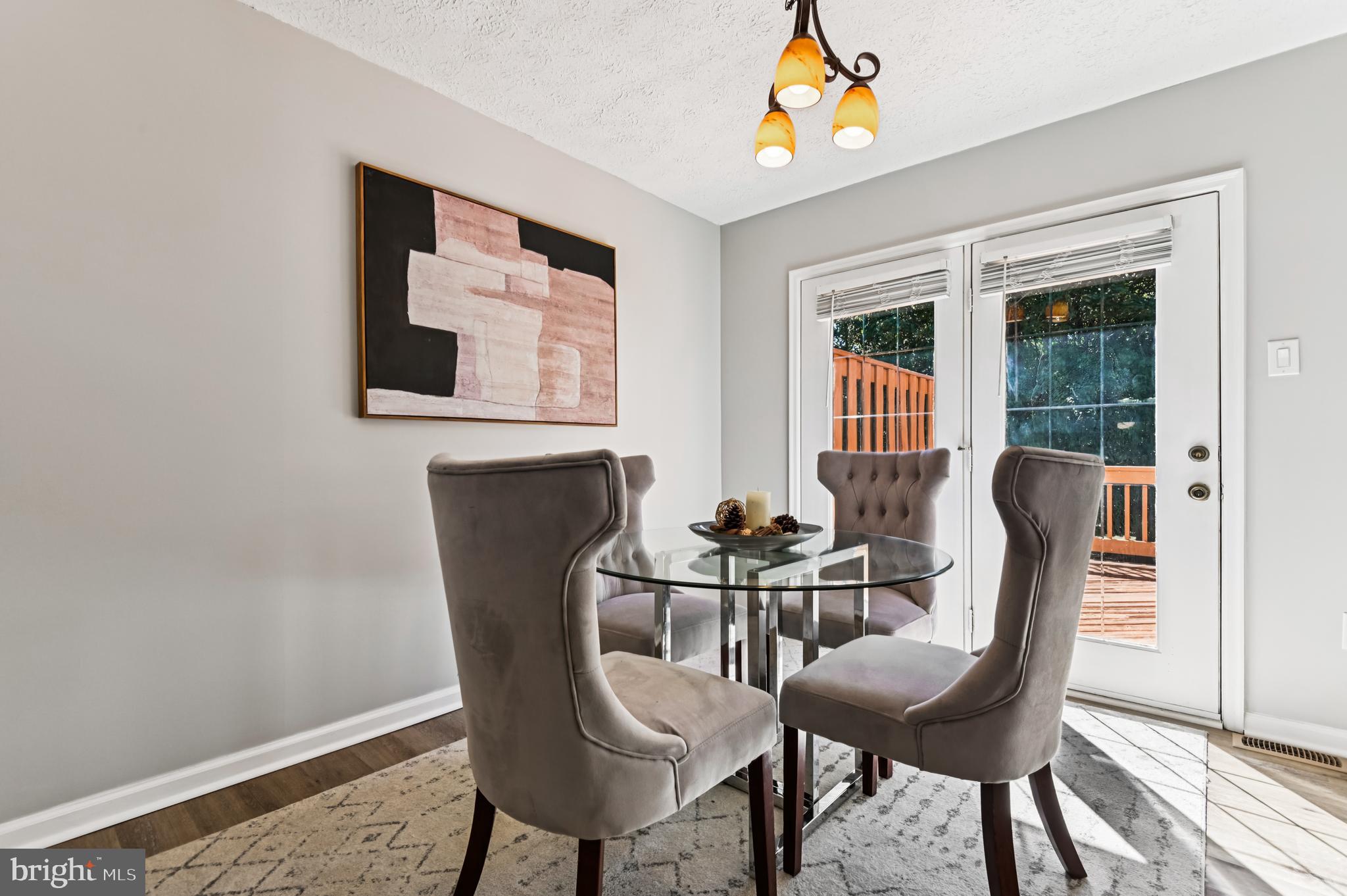 19 Championship Court, Unit K5 Owings Mills, MD 21117 - Photo 9 of 35 a dining room with furniture and window