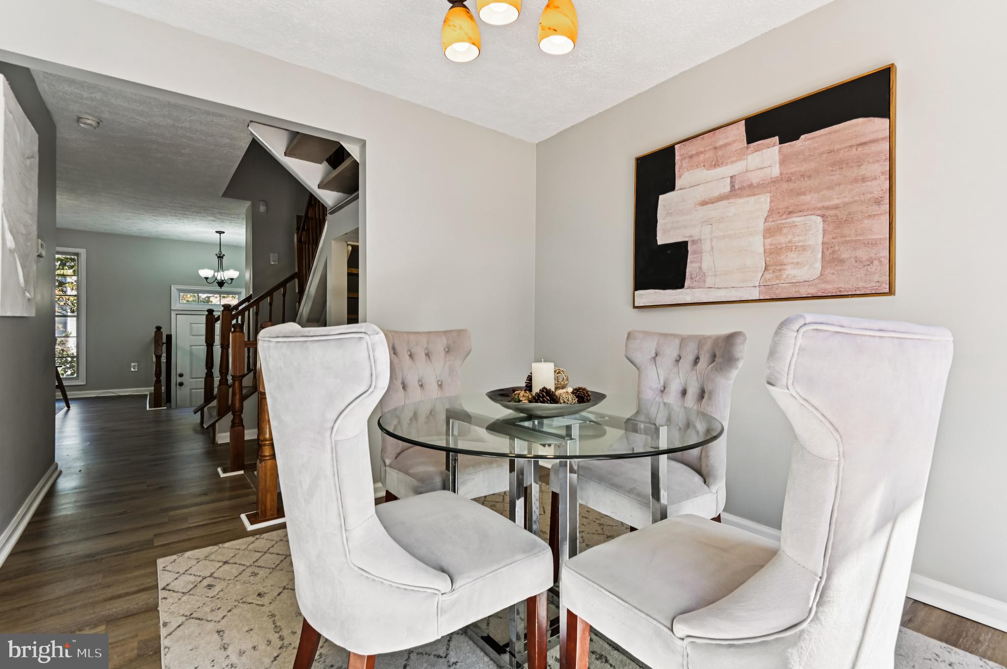 19 Championship Court, Unit K5 Owings Mills, MD 21117 - Photo 10 of 35 a view of a dining room with furniture and wooden floor