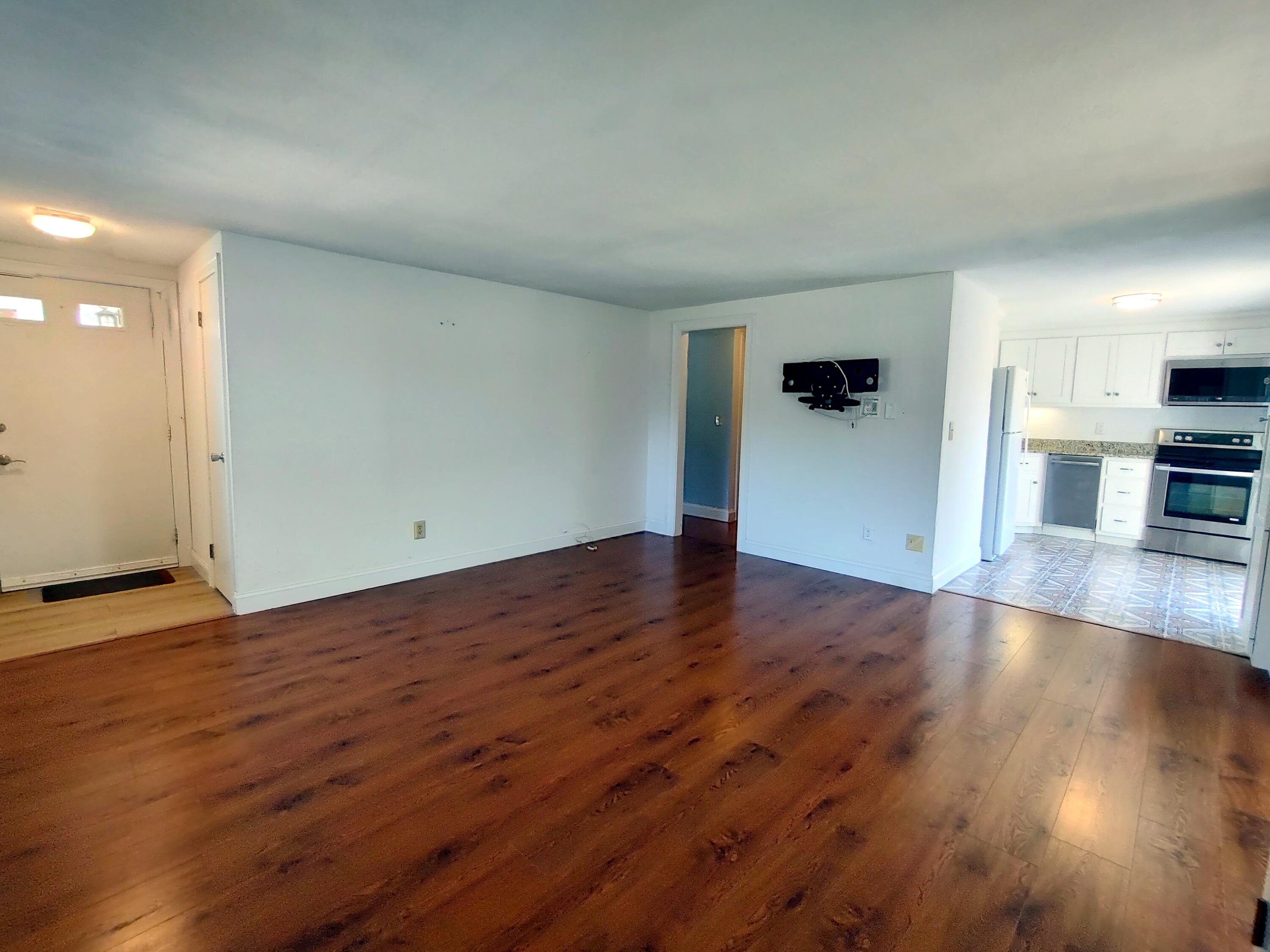 25 Mary-David Road, Unit 50A Yarmouth Port, MA 02675 - Photo 14 of 59 a view of a livingroom with wooden floor