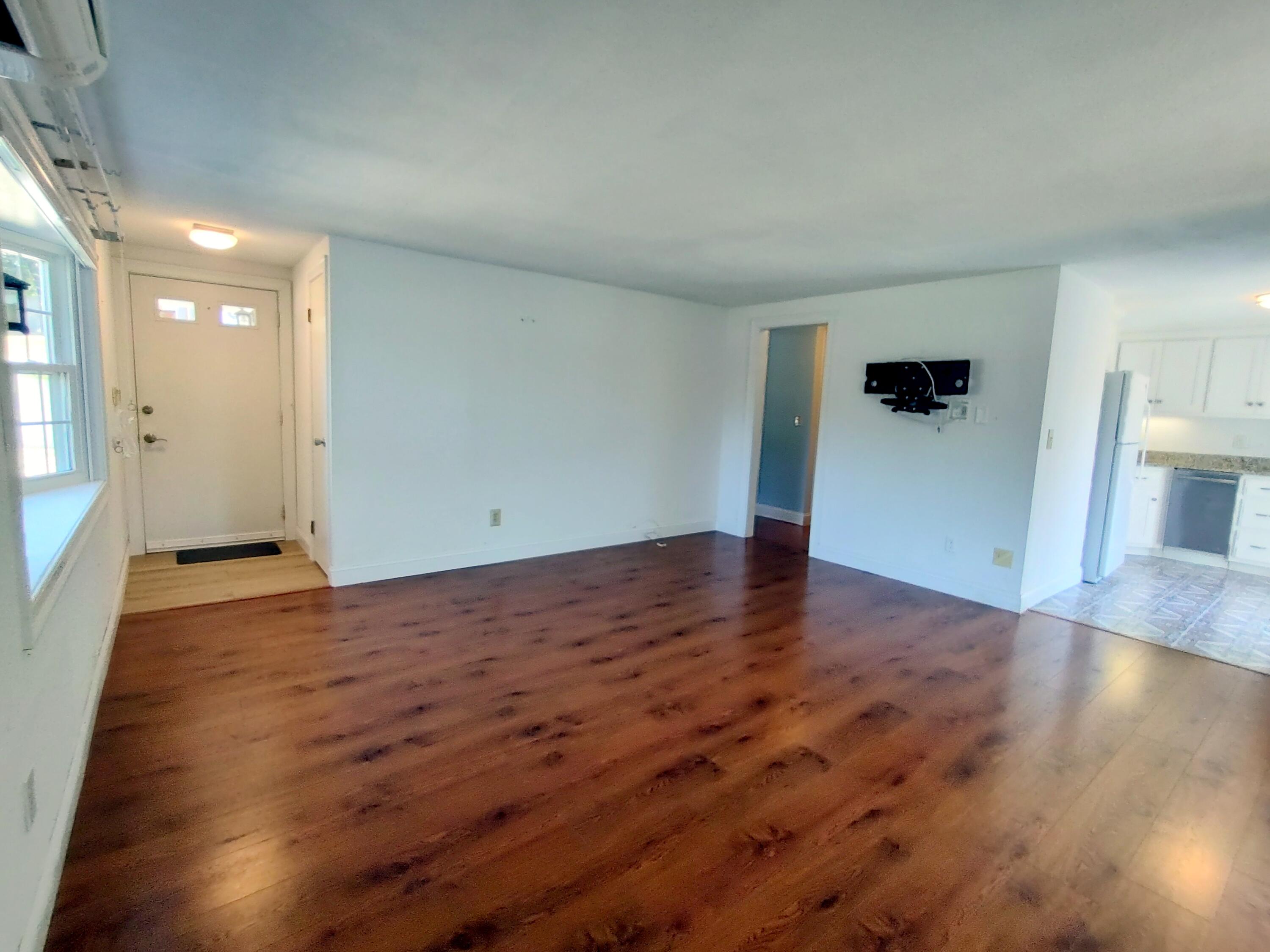 25 Mary-David Road, Unit 50A Yarmouth Port, MA 02675 - Photo 15 of 59 a view of empty room with wooden floor
