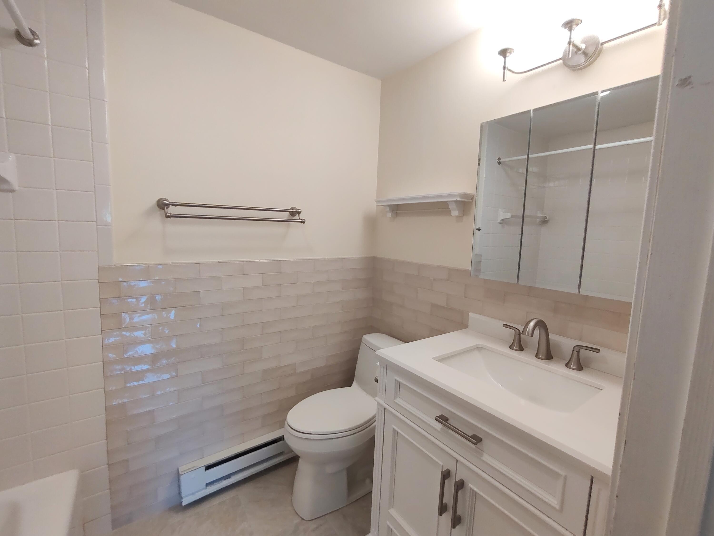 25 Mary-David Road, Unit 50A Yarmouth Port, MA 02675 - Photo 20 of 59 a bathroom with a sink a toilet and shower