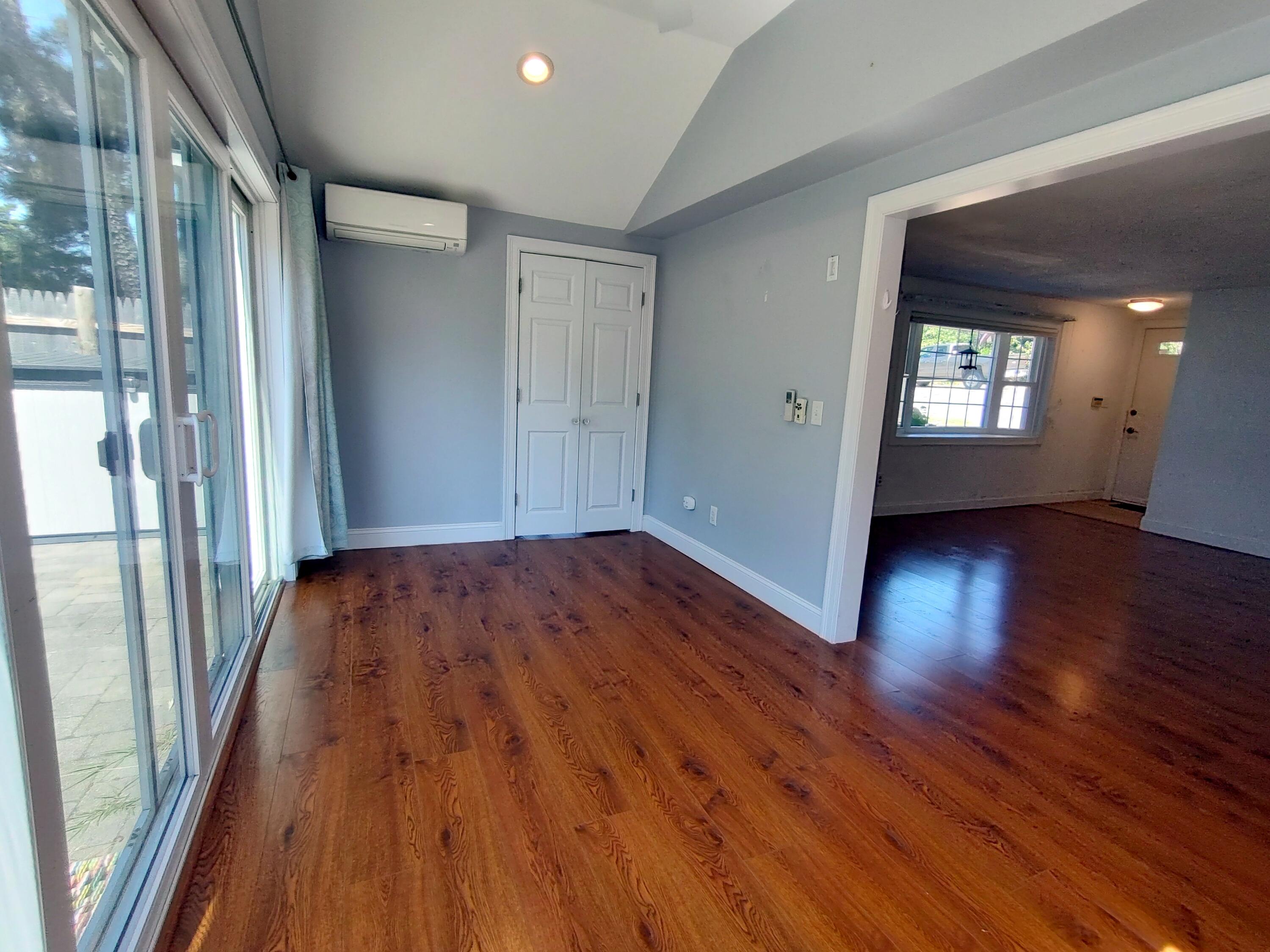 25 Mary-David Road, Unit 50A Yarmouth Port, MA 02675 - Photo 30 of 59 wooden floor in an empty room with a window