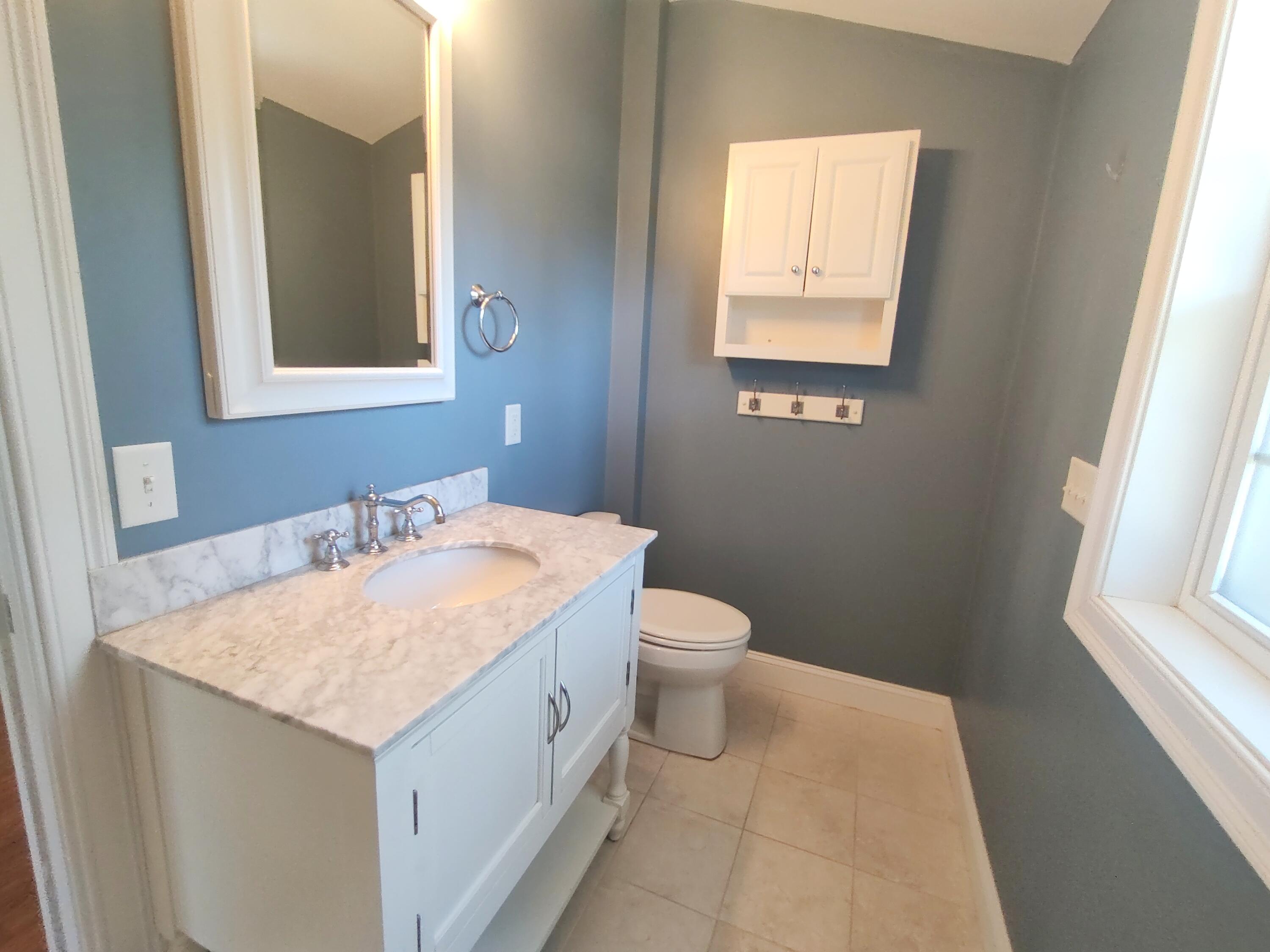 25 Mary-David Road, Unit 50A Yarmouth Port, MA 02675 - Photo 44 of 59 a bathroom with a sink and a toilet