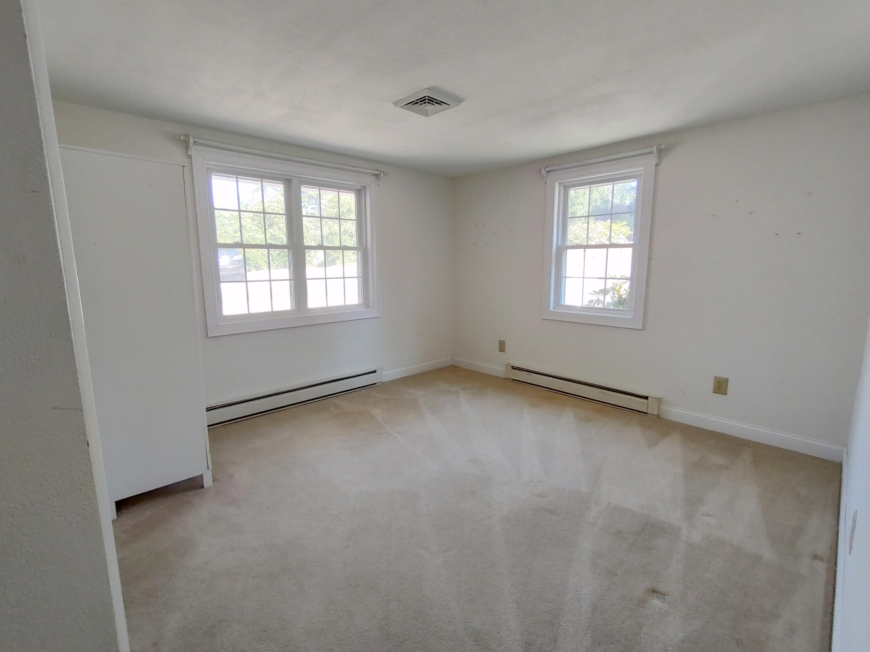 25 Mary-David Road, Unit 50A Yarmouth Port, MA 02675 - Photo 48 of 59 an empty room with a window