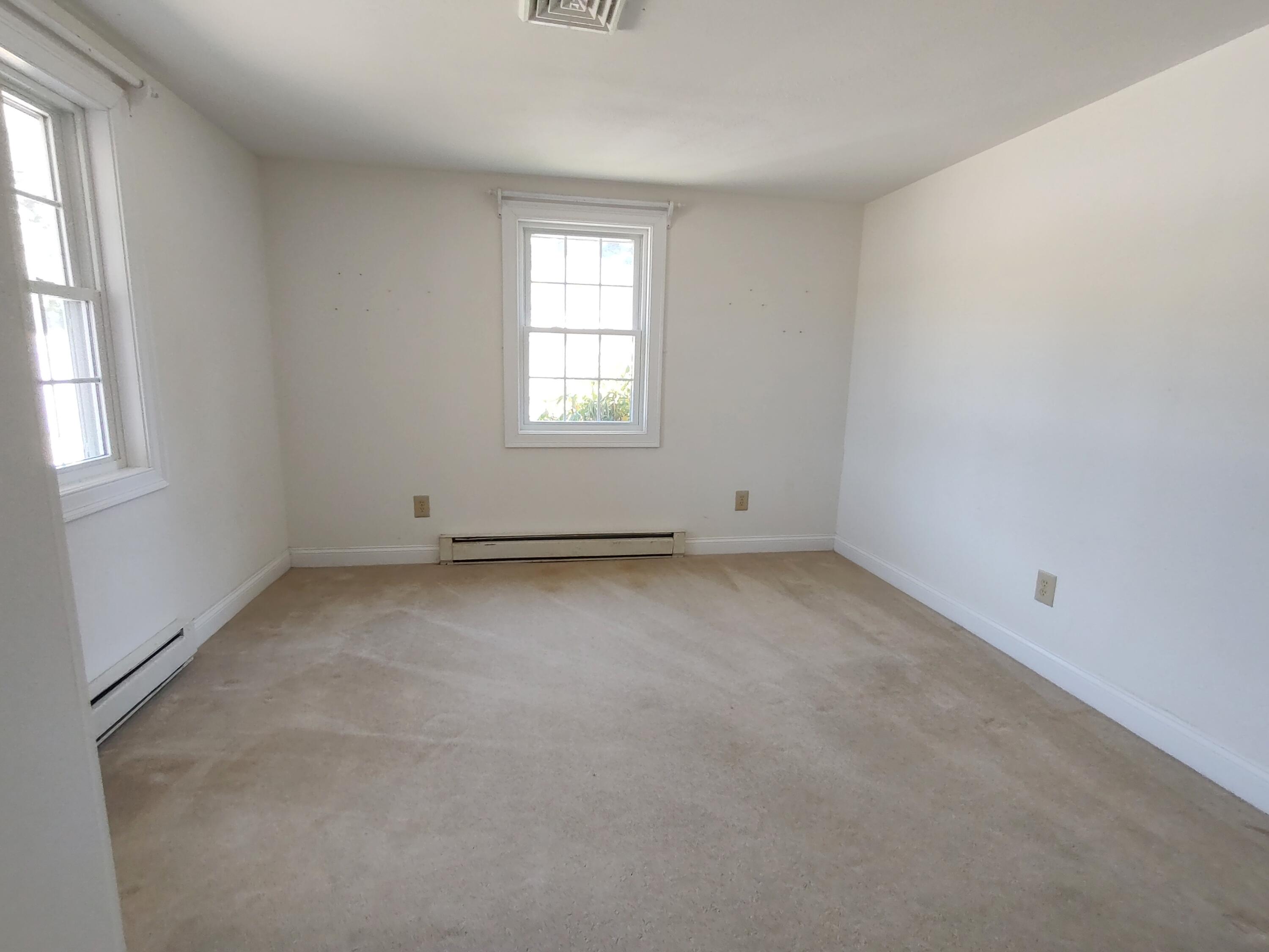 25 Mary-David Road, Unit 50A Yarmouth Port, MA 02675 - Photo 49 of 59 an empty room with windows
