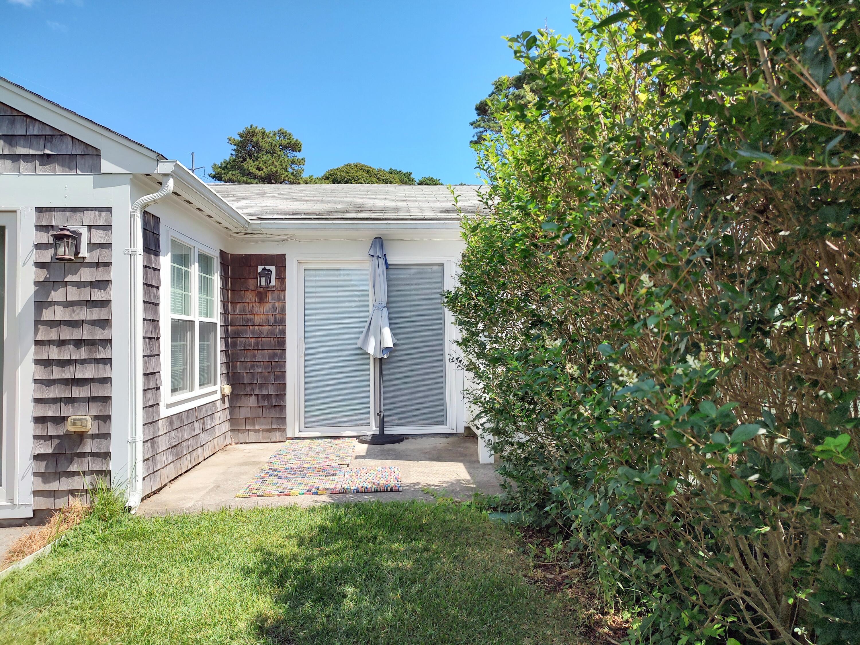 25 Mary-David Road, Unit 50A Yarmouth Port, MA 02675 - Photo 5 of 59 a view of outdoor space and yard