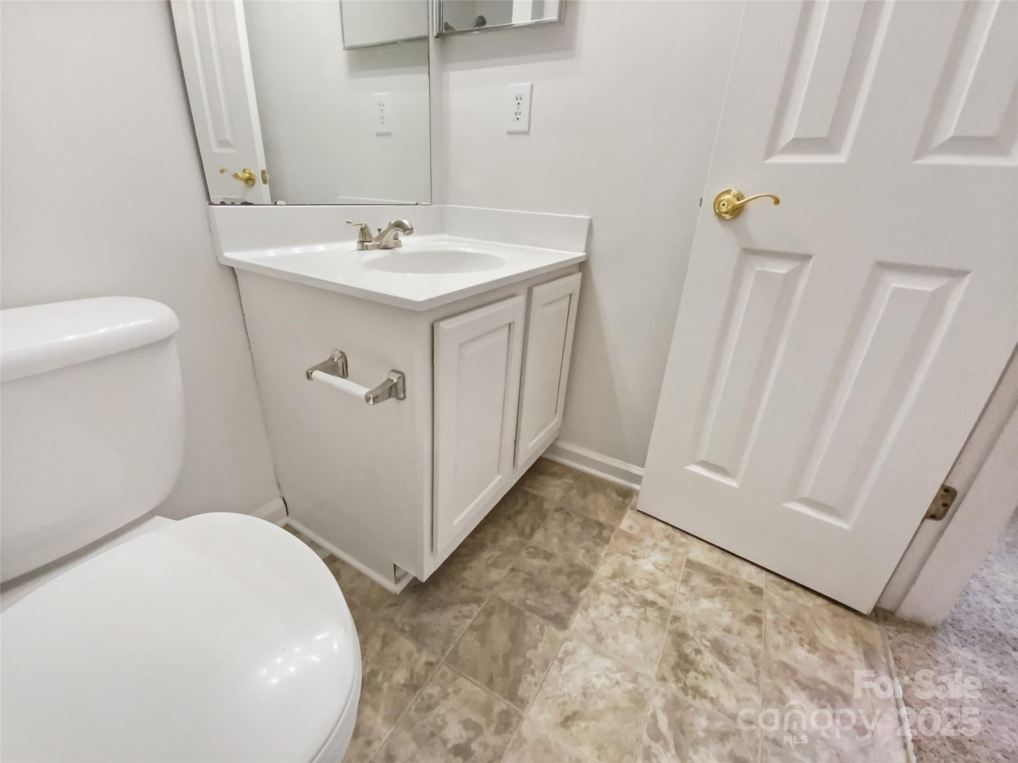 2118 Augusta Street Charlotte, NC 28216 - Photo 17 of 19 a bathroom with a sink a toilet and shower