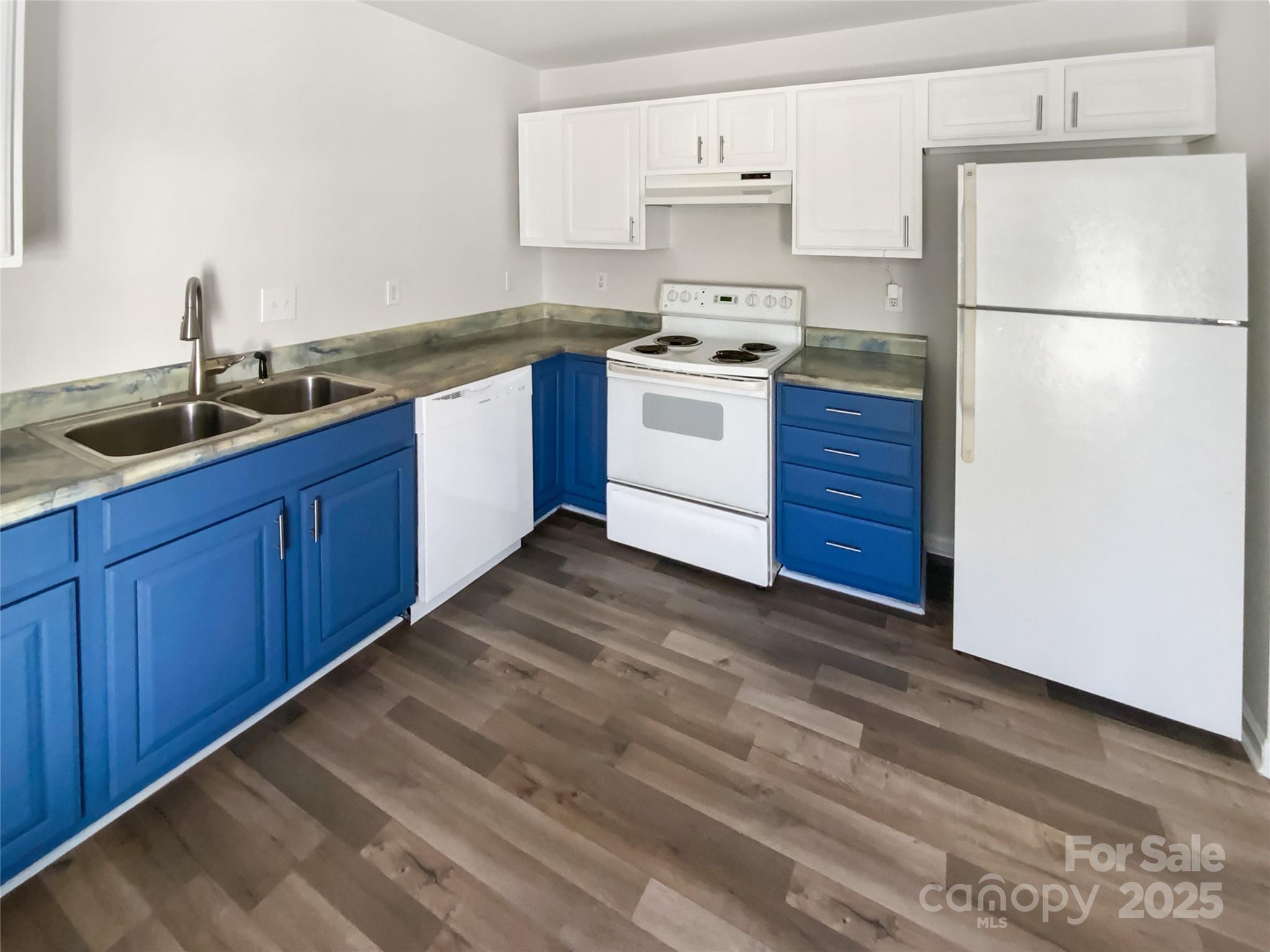 2118 Augusta Street Charlotte, NC 28216 - Photo 2 of 19 a kitchen with stainless steel appliances granite countertop a sink stove and refrigerator