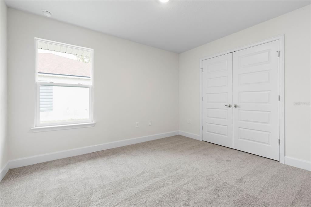 52 Undershire Path Palm Coast, FL 32164 - Photo 26 of 54 an empty room with a window