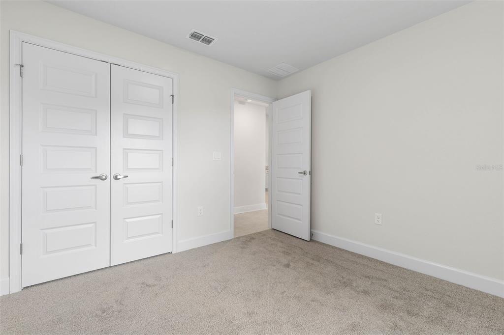 52 Undershire Path Palm Coast, FL 32164 - Photo 30 of 54 an empty room with closet area