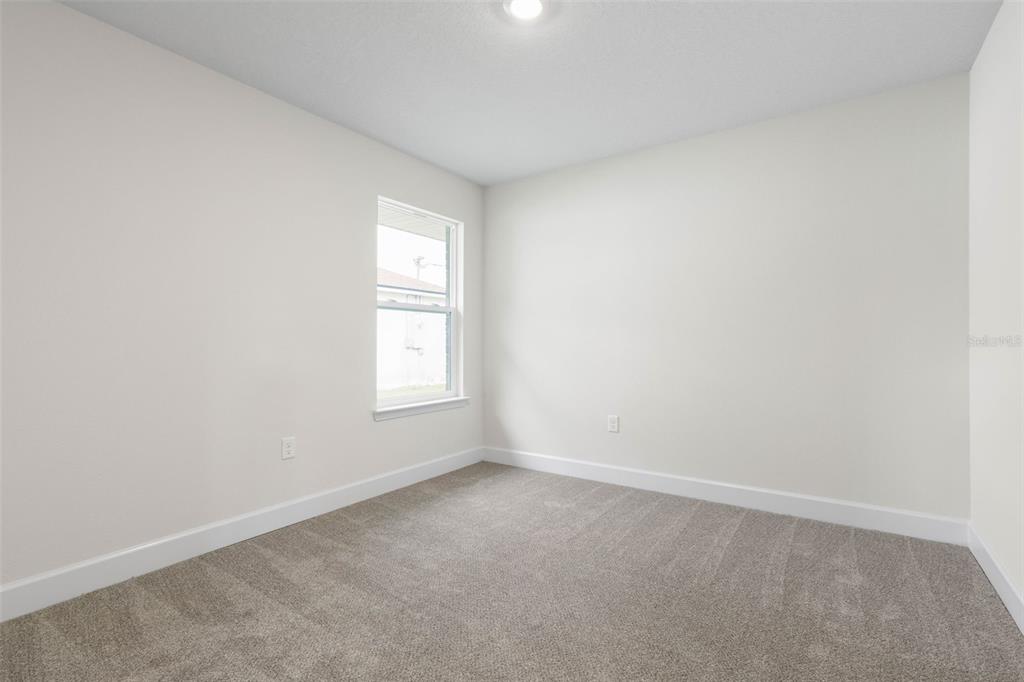 52 Undershire Path Palm Coast, FL 32164 - Photo 31 of 54 an empty room with a window